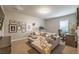 Inviting living room featuring a sectional sofa, home office, and treadmill at 1384 Doublegate Dr, Brookhaven, GA 30319