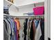 Walk-in closet has clothing rod and shelves offering ample storage space at 1865 Lochlomand Se Ln, Smyrna, GA 30080