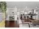 Bright, open-concept living room flows into a modern kitchen with stainless steel appliances and a center island at 1865 Lochlomand Se Ln, Smyrna, GA 30080
