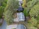 Bird's eye view showcasing a well-maintained property surrounded by mature trees and landscaping at 2199 Summertown Dr, Norcross, GA 30071