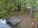 Aerial view of a backyard featuring a wooden deck and a well-maintained fence at 2199 Summertown Dr, Norcross, GA 30071