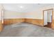 Spacious finished basement with carpeting, paneling, and bright window at 2199 Summertown Dr, Norcross, GA 30071