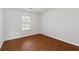 Inviting bedroom with vinyl floors and a window offers a simple, comfortable retreat at 2199 Summertown Dr, Norcross, GA 30071