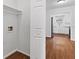 An interior shot showcases a laundry room with wood-look flooring and white cabinetry at 2199 Summertown Dr, Norcross, GA 30071