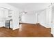 Bright living room featuring hardwood floors and a seamless flow into the kitchen at 2199 Summertown Dr, Norcross, GA 30071