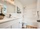 Bright bathroom with a white vanity, quartz counters, tub and shower combination at , Atlanta, GA 30311