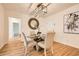 Open concept dining area featuring a glass table and contemporary lighting fixture at , Atlanta, GA 30311