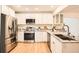 Bright kitchen with stainless steel appliances, granite countertops, and modern cabinetry at , Atlanta, GA 30311
