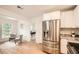 Spacious kitchen with new appliances and hardwood floors that opens to the living room at , Atlanta, GA 30311