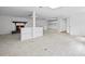 Expansive basement with fireplace and wet bar, offering a perfect space for entertaining or relaxing with guests at 240 Thornton Dr, Fayetteville, GA 30214