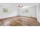 Bright, spacious bedroom with two windows and ceiling fan at 240 Thornton Dr, Fayetteville, GA 30214