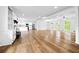 Bright and open-concept living space with hardwood floors and ample natural light at 240 Thornton Dr, Fayetteville, GA 30214