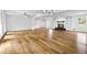 Expansive living room featuring hardwood floors, a fireplace, and recessed lighting at 240 Thornton Dr, Fayetteville, GA 30214