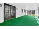 Enclosed sunroom featuring a door and view to adjacent area at 240 Thornton Dr, Fayetteville, GA 30214