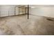 Spacious garage with concrete floor at 46 Norman Rd, Covington, GA 30014