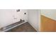 Unfinished utility room showing pipes at 46 Norman Rd, Covington, GA 30014