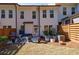 Back of home featuring private, fenced backyard with patio area for entertaining at 5010 Towneship Creek Rd, Roswell, GA 30075