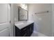 Bathroom with a vanity and marble-like tile floor at 5010 Towneship Creek Rd, Roswell, GA 30075