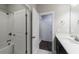 Clean bathroom with tub/shower combination, white subway tile, and modern vanity at 5010 Towneship Creek Rd, Roswell, GA 30075