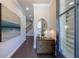 Inviting entryway with hardwood floors, elegant decor, and staircase to the upper level at 5010 Towneship Creek Rd, Roswell, GA 30075