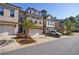 Street view of a charming townhome community with manicured lawns and attractive exteriors at 5010 Towneship Creek Rd, Roswell, GA 30075