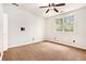 Bedroom with carpet, a ceiling fan and bright windows at 5145 Southlake Dr, Alpharetta, GA 30005