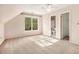 Upstairs bedroom has a ceiling fan and a bathroom for the occupant's convenience at 5145 Southlake Dr, Alpharetta, GA 30005