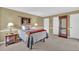 Bedroom with plush carpet, neutral walls and white trim at 6690 Pine Ridge Cir, Cumming, GA 30041