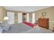 Bedroom with soft colors, plush carpet and neutral paint at 6690 Pine Ridge Cir, Cumming, GA 30041