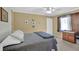 Neutral bedroom features a plush carpet and a ceiling fan at 6690 Pine Ridge Cir, Cumming, GA 30041