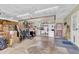 Spacious garage area with ample storage, shelving, and convenient access door at 6690 Pine Ridge Cir, Cumming, GA 30041