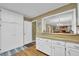 Spacious kitchen with pantry and pass-through to dining room, perfect for entertaining at 6690 Pine Ridge Cir, Cumming, GA 30041