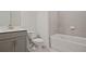 Beautiful bathroom with tile, bathtub, vanity, sink, toilet, and mirror at 4212 Adler Cir, Buford, GA 30519