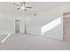 Bedroom featuring carpet, ceiling fan, and ensuite bath, providing comfort and functionality at 4212 Adler Cir, Buford, GA 30519