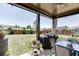 Enjoy the covered patio, large fenced backyard and green lawn for entertaining and relaxing at 4685 Orchard View Way, Cumming, GA 30028