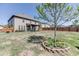 Spacious backyard featuring a well-maintained lawn, patio, and fenced-in perimeter at 4685 Orchard View Way, Cumming, GA 30028