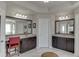 Bright bathroom with double vanity and large mirrors offering style and functionality to your daily routine at 4685 Orchard View Way, Cumming, GA 30028