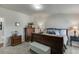 Bedroom featuring a cozy bed, bedside lamps, and a dresser for a comfortable and relaxing space at 4685 Orchard View Way, Cumming, GA 30028