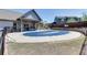 Community pool area featuring a covered pool and deck with lounge chairs at 4685 Orchard View Way, Cumming, GA 30028