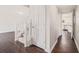 Bright entryway featuring wood floors, white trim, and staircase leading to the upper level at 1577 Linksview Close, Stone Mountain, GA 30088
