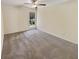 Neutral bedroom with a window letting in natural light, and soft carpeting creating a relaxing ambiance at 3301 Henderson Mill Rd # 1, Atlanta, GA 30341