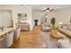 Staged living room features hardwood floors, ceiling fan, and neutral decor at 3301 Henderson Mill Rd # 1, Atlanta, GA 30341