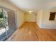 Open living room featuring hardwood floors and sliding glass door leading to a patio at 3301 Henderson Mill Rd # 1, Atlanta, GA 30341