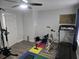 Basement gym featuring a treadmill, exercise bike, and weight equipment at 5980 Sherwood Trce, Lithonia, GA 30038