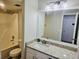 Bathroom with granite vanity top and shower over tub at 5980 Sherwood Trce, Lithonia, GA 30038