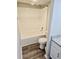 Clean bathroom showcasing a tub/shower combo with fresh white tile and a modern vanity at 5980 Sherwood Trce, Lithonia, GA 30038