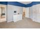 Neutral bedroom with two-tone walls and carpet flooring at 6463 Century Park Se Pl, Mableton, GA 30126