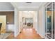 Inviting entryway with hardwood floors flowing into a bright living space, showcasing an open floor plan at 6463 Century Park Se Pl, Mableton, GA 30126