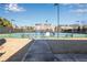 Community tennis court with benches and trash cans, providing a convenient amenity for residents and their guests at 6463 Century Park Se Pl, Mableton, GA 30126