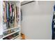 Organized walk-in closet with hanging racks, shelving, and drawers, providing ample storage at 6463 Century Park Se Pl, Mableton, GA 30126